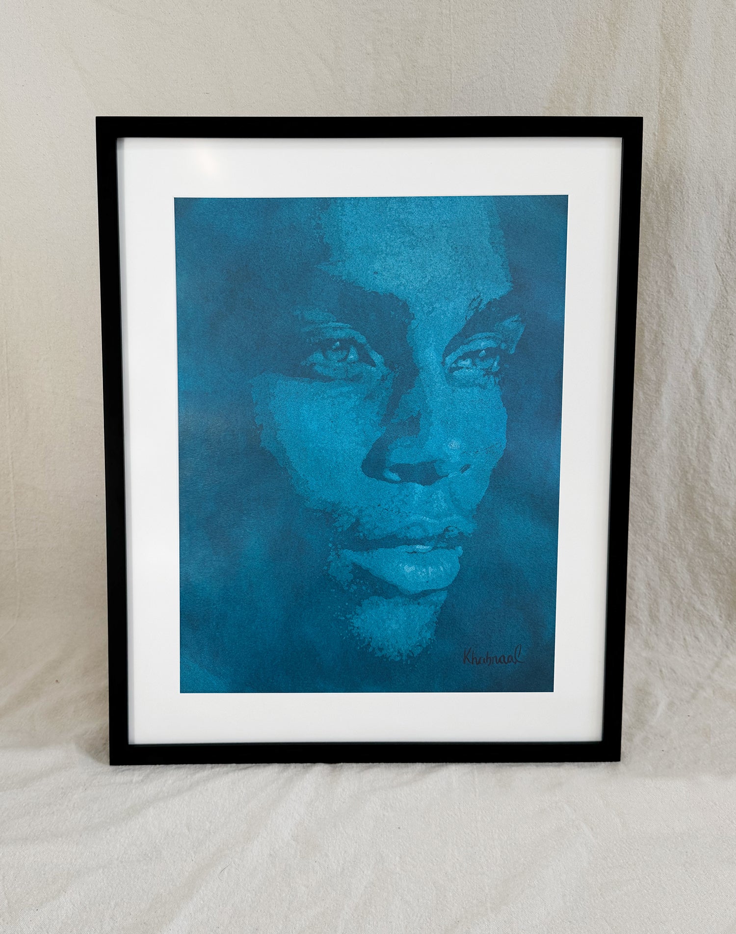 Framed view of Michael, an original acrylic portrait by Khabraal, shown in its museum frame