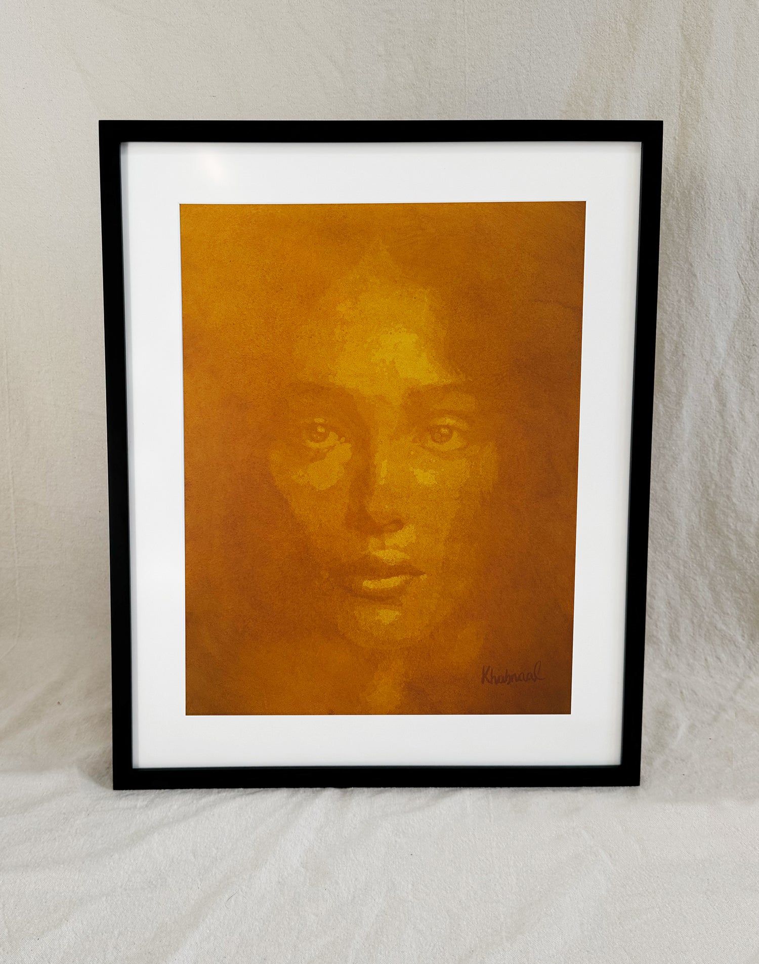 Framed view of Aziza, an original acrylic portrait by Khabraal, shown in its museum frame