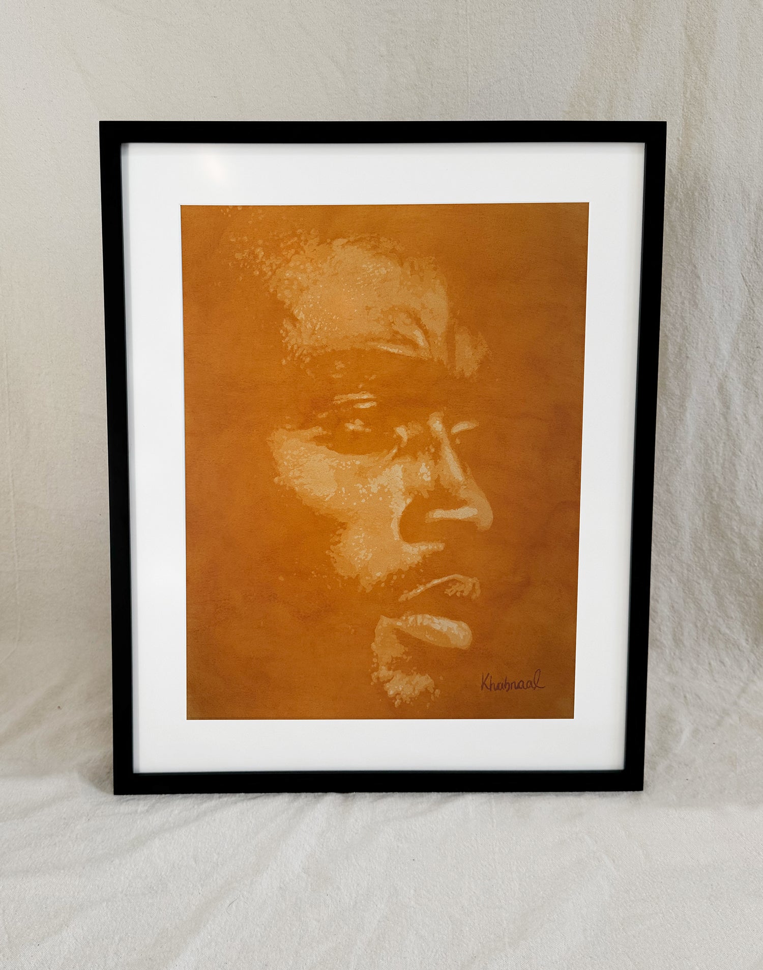 Framed view of Davon, an original acrylic portrait by Khabraal, shown in its museum frame