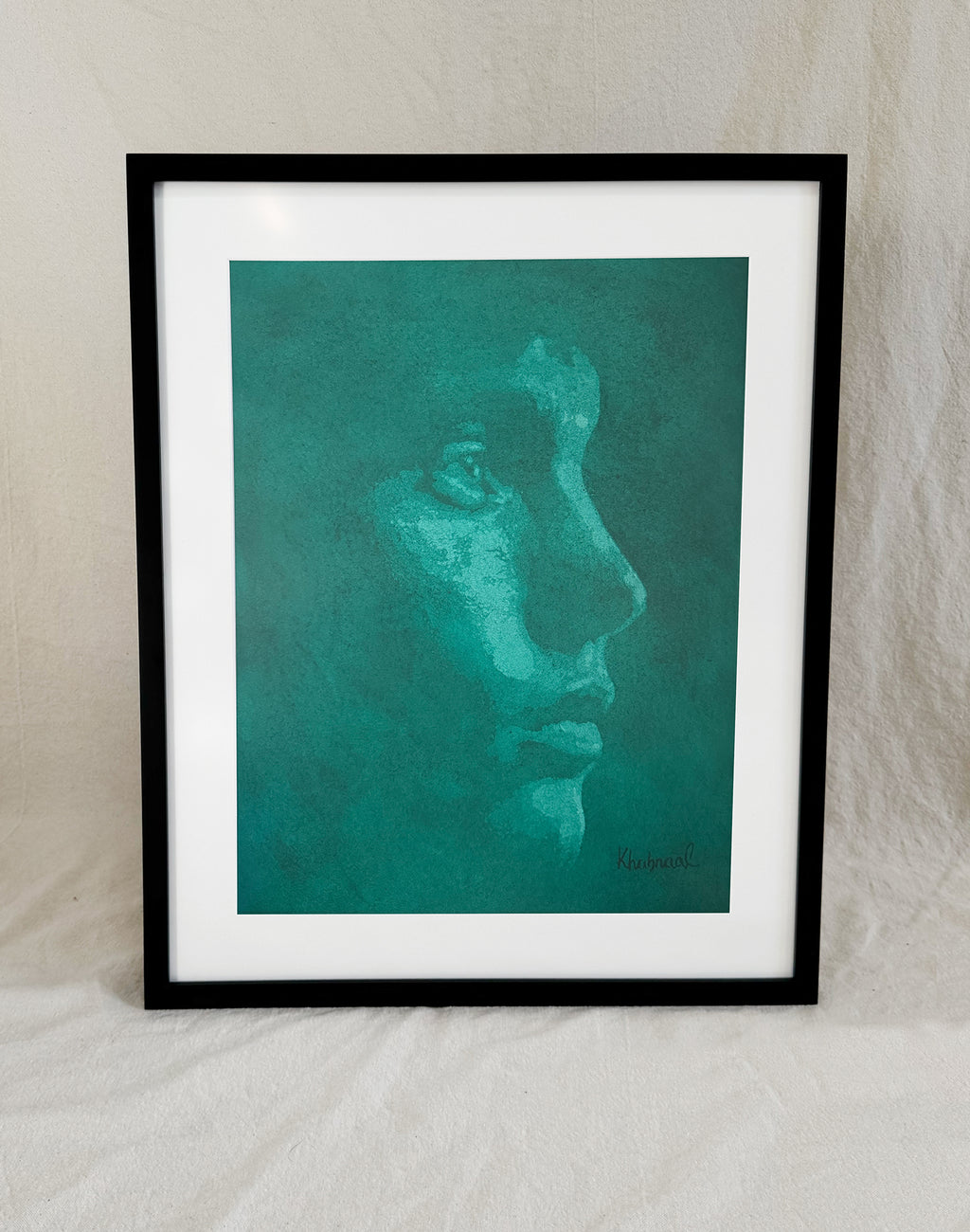 Framed view of Paul, an original acrylic portrait by Khabraal, shown in its museum frame