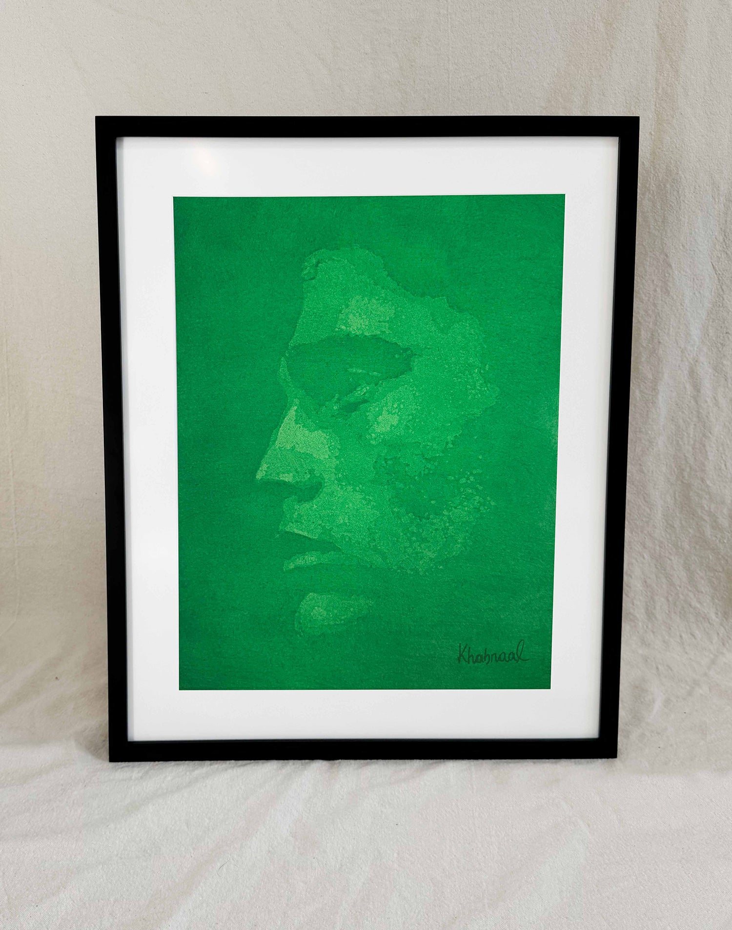 Framed view of Wesley, an original acrylic portrait by Khabraal, shown in its museum frame