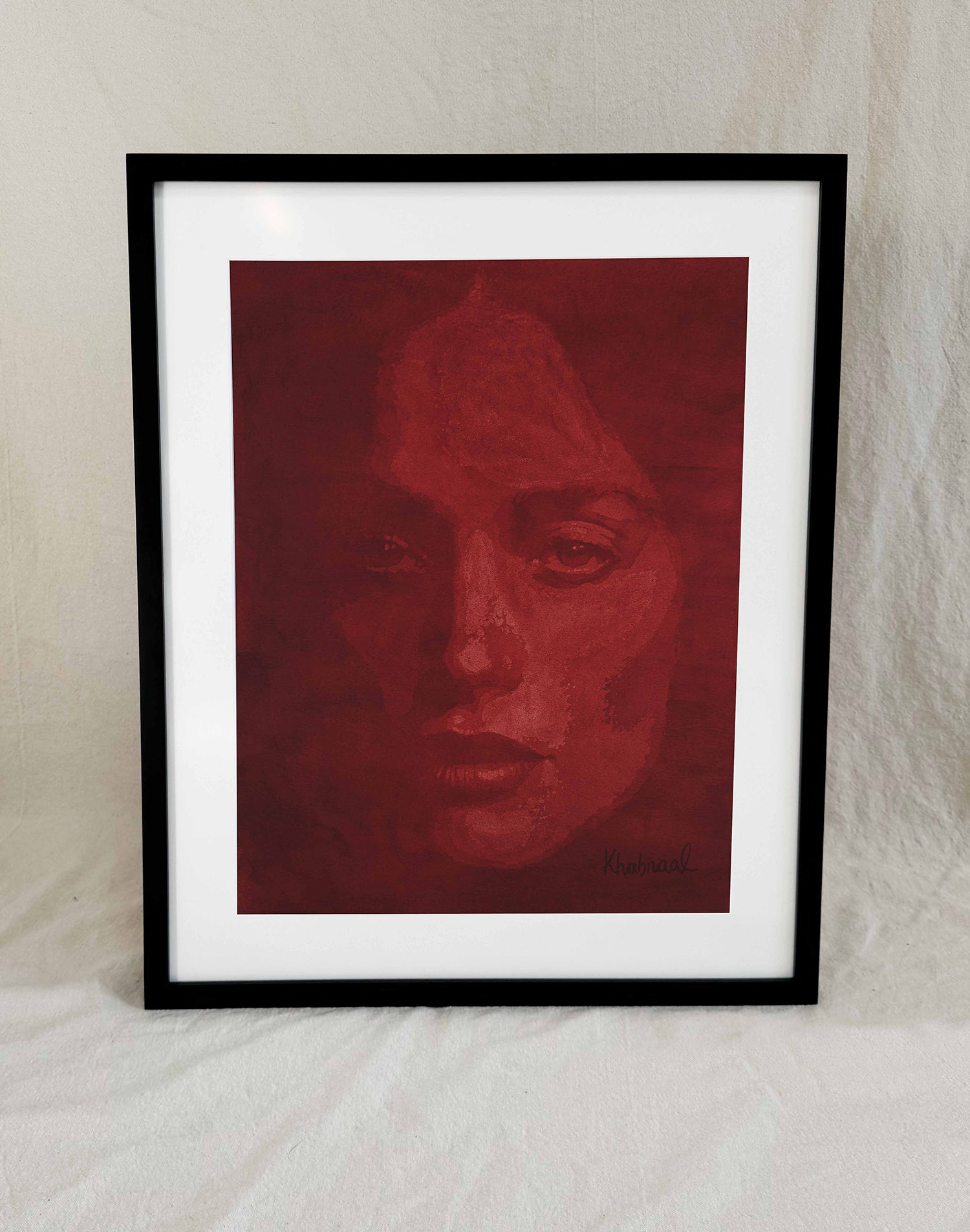Framed view of Gigi, an original acrylic portrait by Khabraal, shown in its museum frame