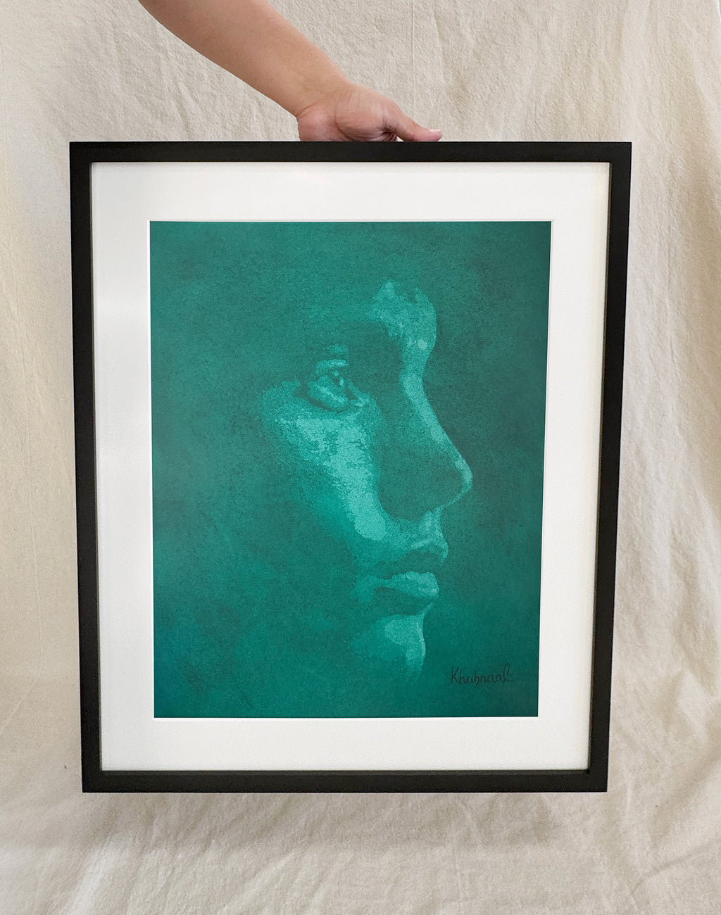 Hand shown for scale against Paul, a 15.25 × 19.25 inch original acrylic portrait