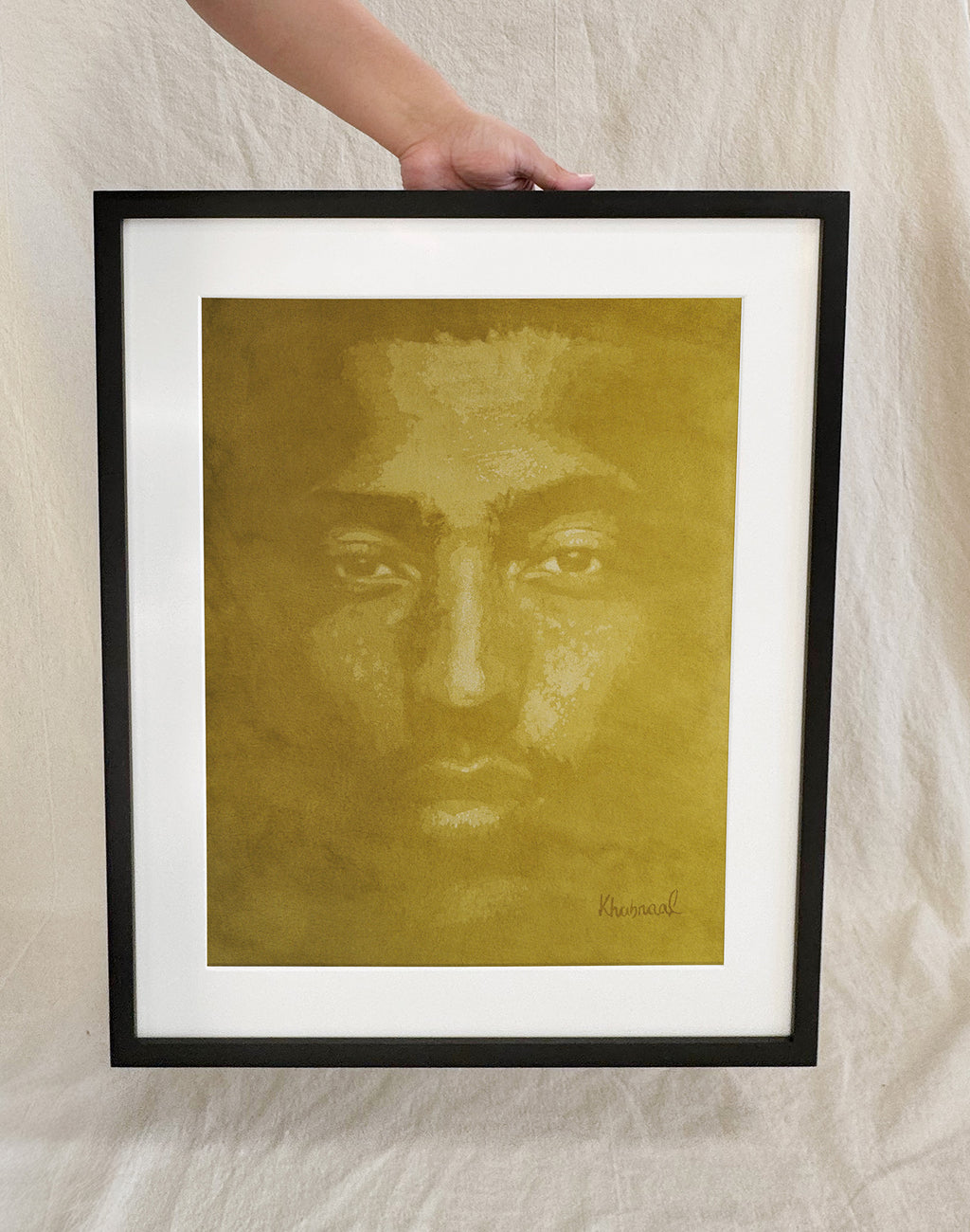 Hand shown for scale against John, a 15.25 × 19.25 inch original acrylic portrait
