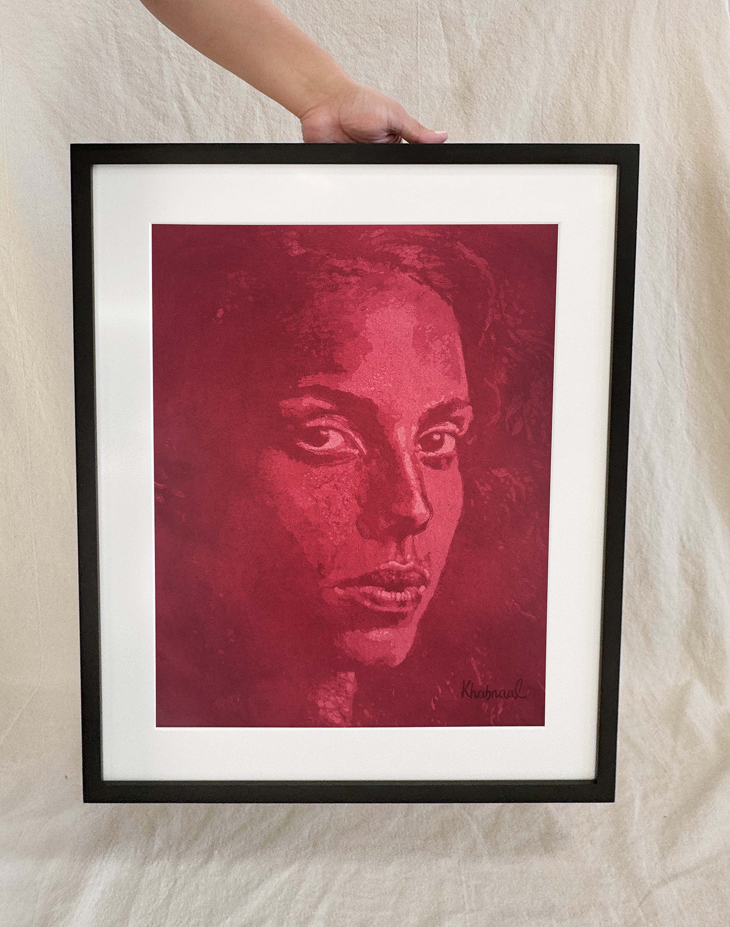 Hand shown for scale against Cynthia, a 15.25 × 19.25 inch original acrylic portrait