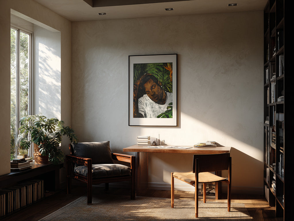 Mauricio’s portrait hanging above a desk in a warm, light-filled home office.